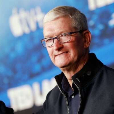 Apple's Tim Cook Upbeat in Beijing as China Courts Global CEOs
