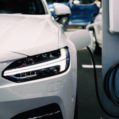 What the EV Price War Means for Investors and Businesses Wanting to Install Charging Stations