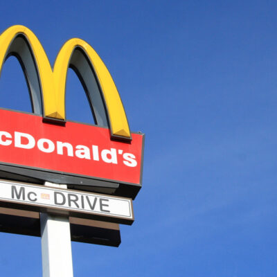 McDonald's cuts pay packages for some employees