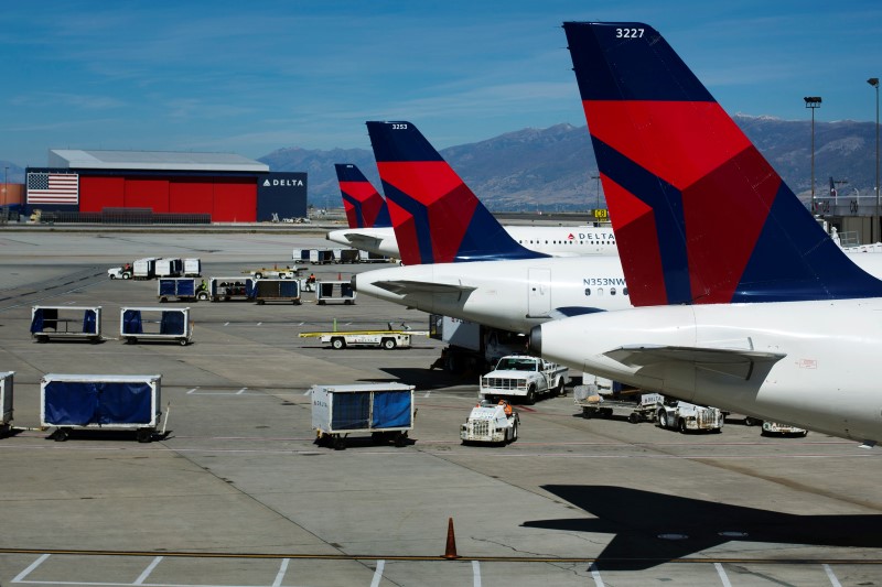 Delta soars to record quarterly earnings, lifts guidance